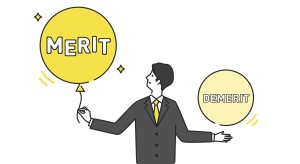 メリットと書かれた風船を持つ男性のイラスト